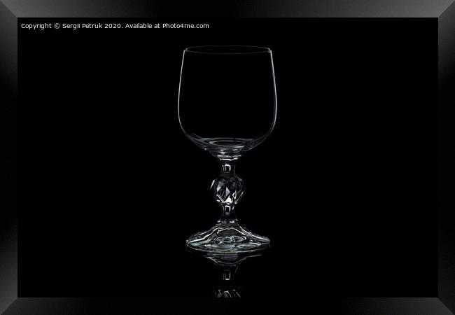 glass wine glass isolated on a black background Framed Print by Sergii Petruk