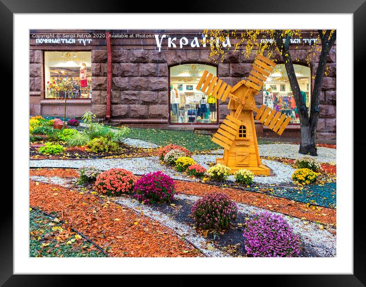 bright color area in front of the store Ukraine in the center of Kyiv on a rainy day of October 2017 Framed Mounted Print by Sergii Petruk