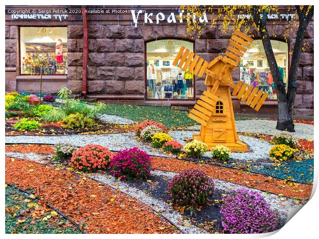 bright color area in front of the store Ukraine in the center of Kyiv on a rainy day of October 2017 Print by Sergii Petruk