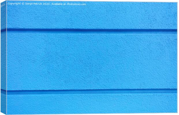 Concrete wall texture bright blue plaster with horizontal dividing grooves on the wall. Canvas Print by Sergii Petruk
