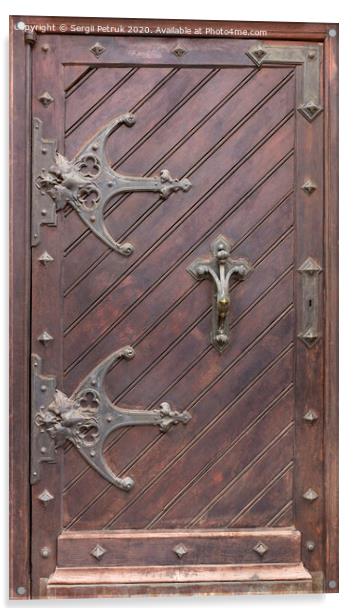 Ancient antique wooden doors with wrought iron loops and cross bars. Acrylic by Sergii Petruk
