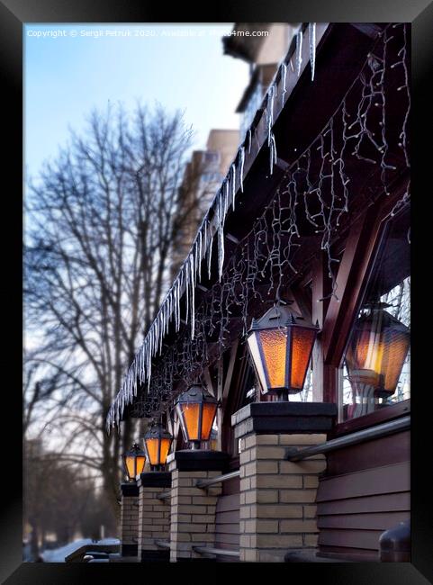 bright street lights near the restaurant illuminate the early spring morning Framed Print by Sergii Petruk
