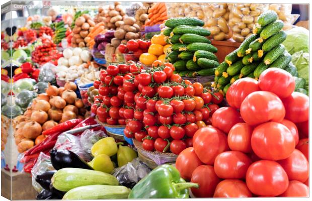 tomatoes, cucumbers, peppers and other vegetables for sale on the market Canvas Print by Sergii Petruk