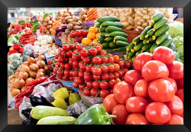 tomatoes, cucumbers, peppers and other vegetables for sale on the market Framed Print by Sergii Petruk