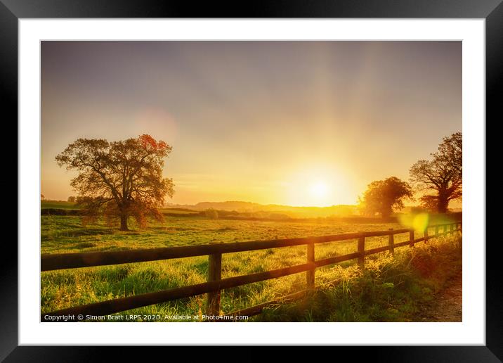 Rural sunrise over fenced field Framed Mounted Print by Simon Bratt LRPS