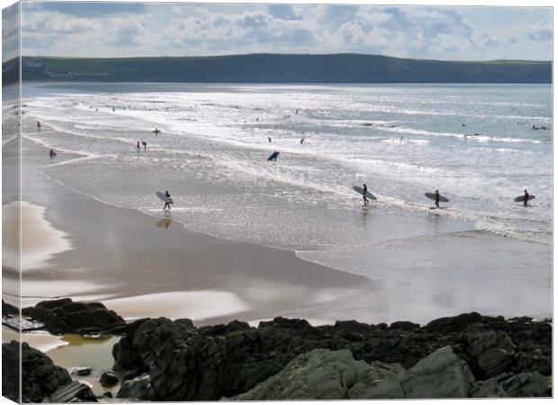 Riding the Waves at Woolacombe Beach Canvas Print by Beryl Curran