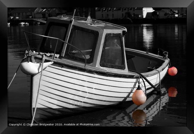 Fishing boat in harbour Framed Print by Christian Bridgwater