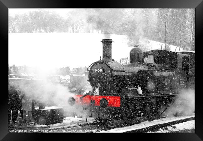 Steam train in snow Framed Print by Christian Bridgwater