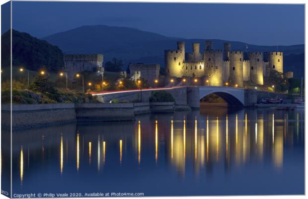 Conwy Castle Illuminated at Twilight. Canvas Print by Philip Veale