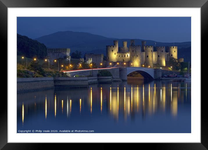 Conwy Castle Illuminated at Twilight. Framed Mounted Print by Philip Veale