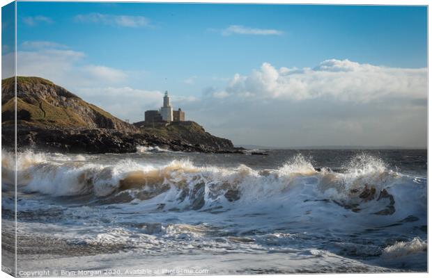 Mumbles lighthouse and wave Canvas Print by Bryn Morgan