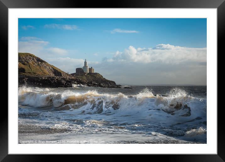 Mumbles lighthouse and wave Framed Mounted Print by Bryn Morgan