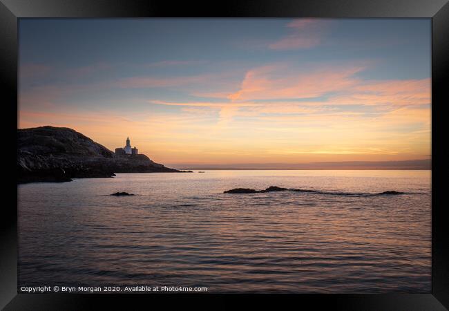 Mumbles lighthouse at sunrise Framed Print by Bryn Morgan