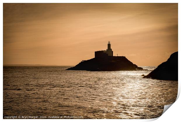 Mumbles lighthouse at sunrise Print by Bryn Morgan