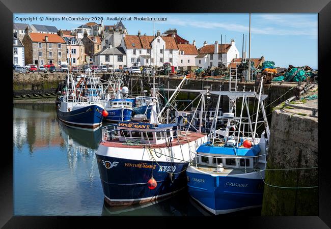 Fishing boats moored in Pittenweem Harbour Framed Print by Angus McComiskey