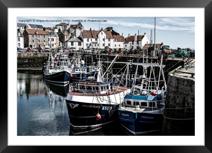 Fishing boats moored in Pittenweem Harbour Framed Mounted Print by Angus McComiskey