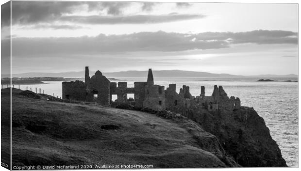 The old ruin of Dunluce Castle Canvas Print by David McFarland