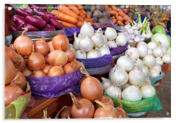 different varieties of onions are sold in trays on the market Acrylic by Sergii Petruk