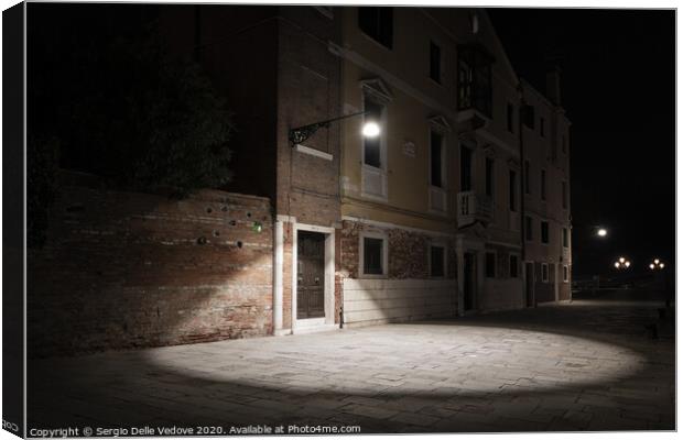 light on the street in Venice Canvas Print by Sergio Delle Vedove