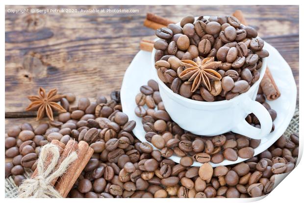 Grain coffee in a cup. Cinnamon on a platter and tied with string. Anise stars complement the aroma of coffee. Print by Sergii Petruk