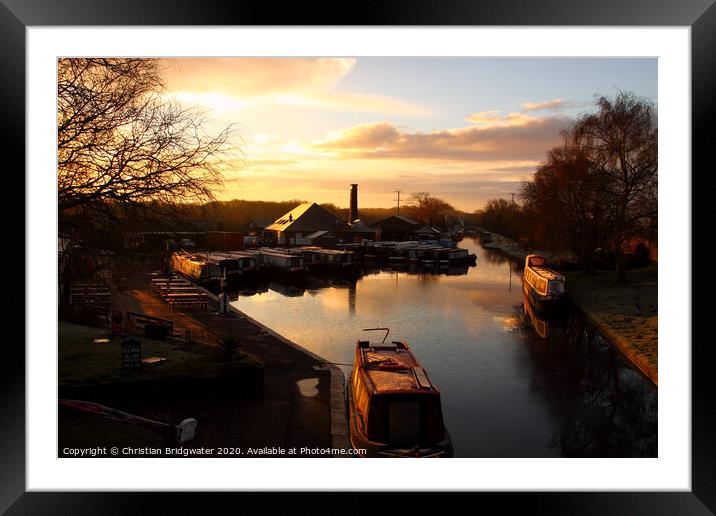 Barges at sunrise at Norbury Junction on the Shropshire Union Canal in Staffordshire, England, UK Framed Mounted Print by Christian Bridgwater