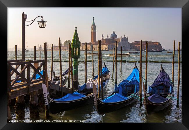 Venice in Italy Framed Print by Chris Dorney