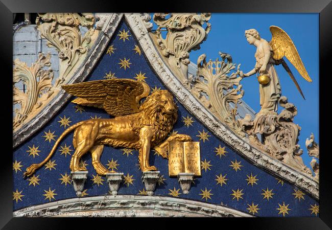 Sculpture of the Lion of Venice on St. Marks Basilica Framed Print by Chris Dorney