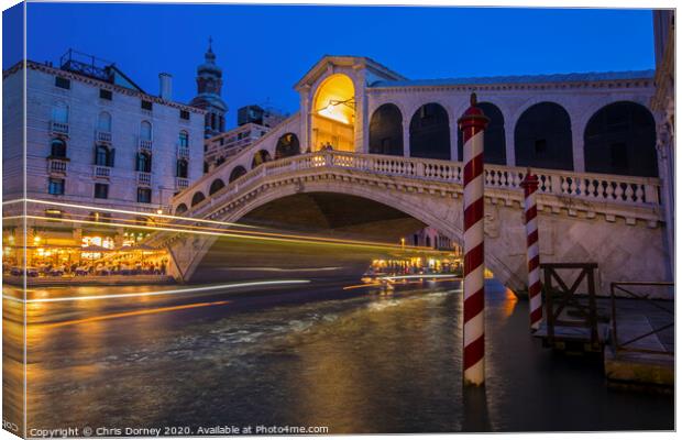 Rialto Bridge in Venice Canvas Print by Chris Dorney