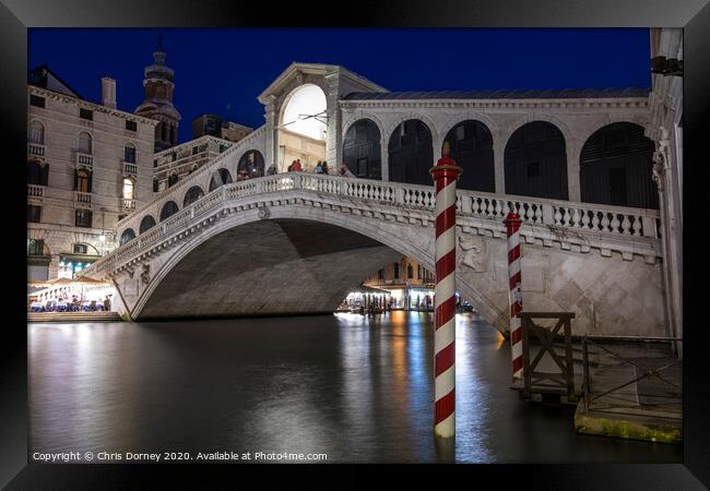 Rialto Bridge in Venice Framed Print by Chris Dorney