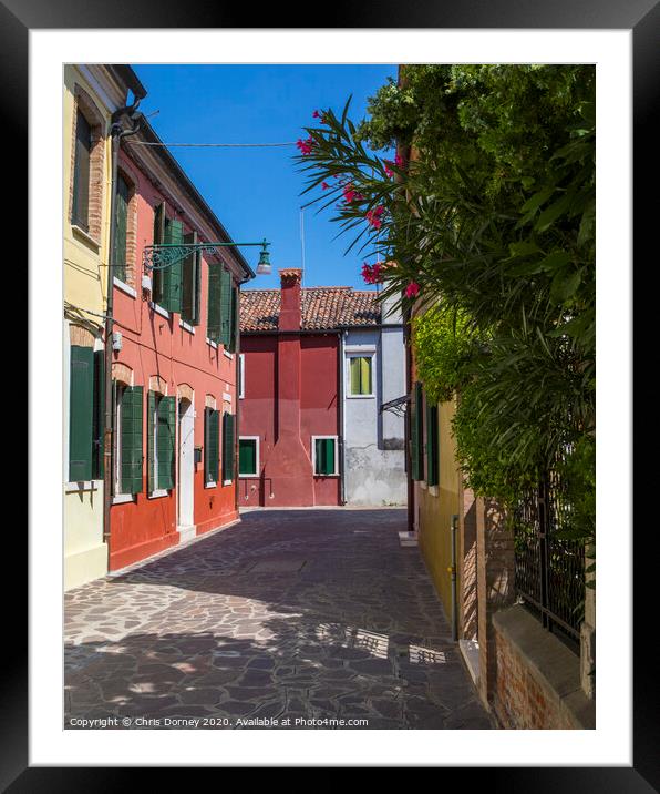 The Island of Burano in Italy Framed Mounted Print by Chris Dorney