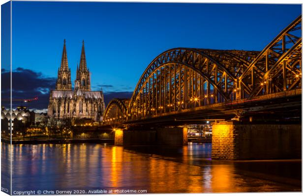Cologne Cathedral and the Hohenzollern Bridge Canvas Print by Chris Dorney