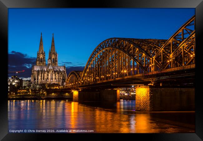 Cologne Cathedral and the Hohenzollern Bridge Framed Print by Chris Dorney