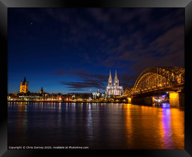 Planet Venus over the City of Cologne in Germany Framed Print by Chris Dorney