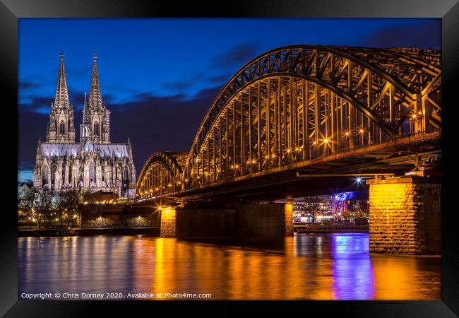 Cologne Cathedral and the Hohenzollern Bridge Framed Print by Chris Dorney