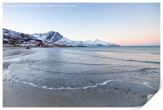 Snowy mountains from a beach in Norway Print by Amanda Hart