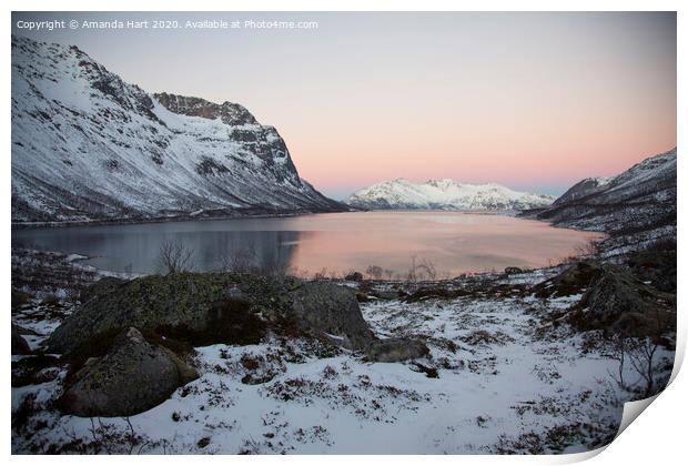Winter sun over a fjord in Norway Print by Amanda Hart