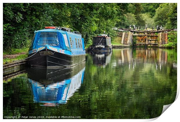Two narrow boats and a lock gate. Print by Peter Jones