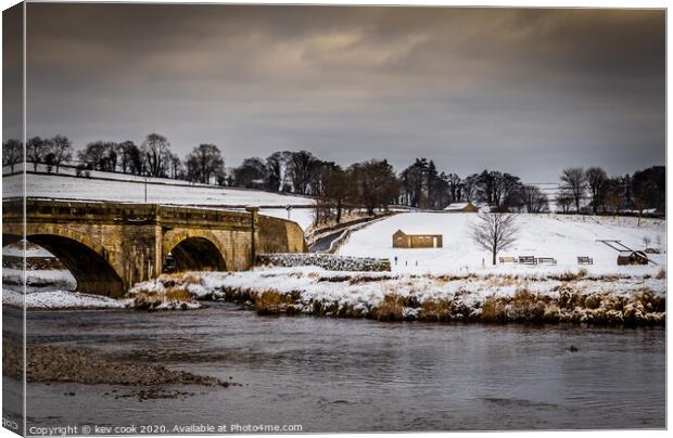 Burnsall in the snow Canvas Print by kevin cook