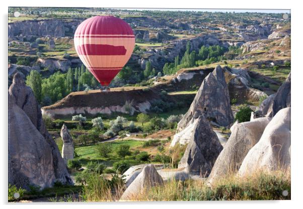 A balloon is flying over the valley in Cappadocia Acrylic by Sergii Petruk
