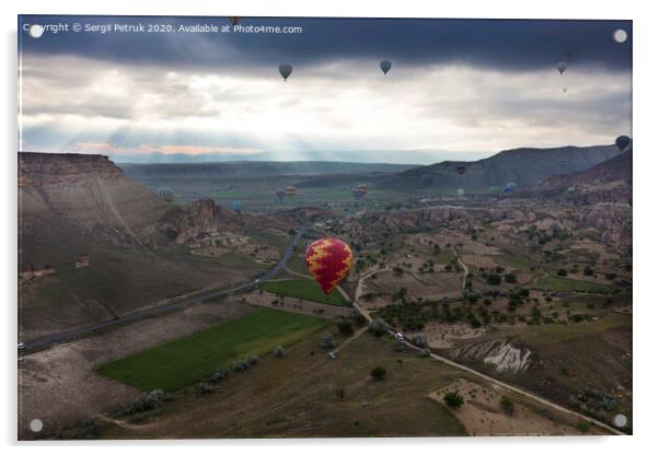 A balloons is flying over the valley in Cappadocia Acrylic by Sergii Petruk