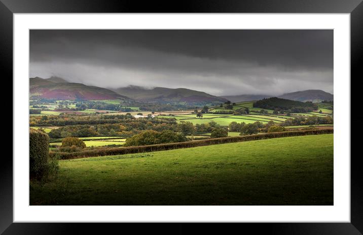 Dark clouds over the Brecon beacons Framed Mounted Print by Leighton Collins