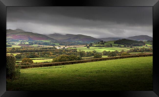 Dark clouds over the Brecon beacons Framed Print by Leighton Collins