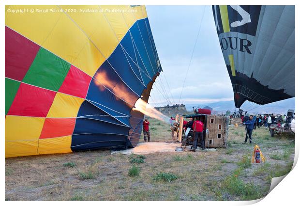 13.05.2018. Cappadocia, Goreme, Turkey. The process of inflating hot air balloons Print by Sergii Petruk