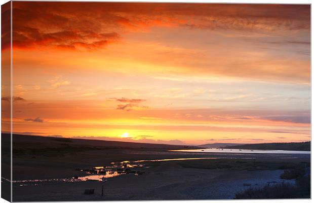 Sunset Over the Fleet Canvas Print by Nicola Clark