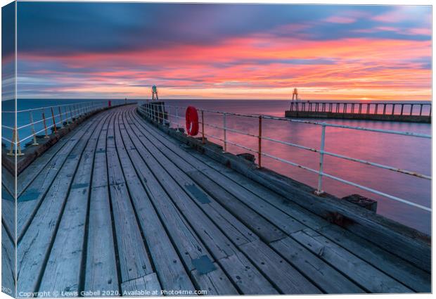 Fiery Sunrise at Whitby Pier, Yorkshire, UK Canvas Print by Lewis Gabell