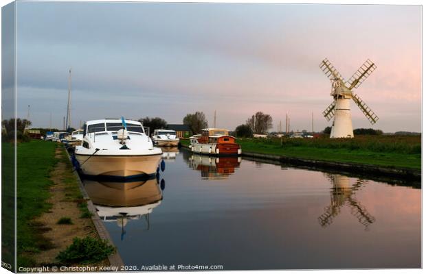 Dawn at Thurne mill Canvas Print by Christopher Keeley