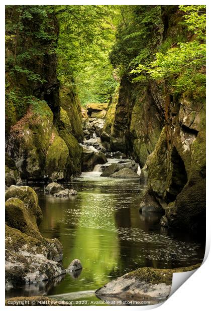 Stunning ethereal landscape of deep sided gorge with rock walls and stream flowing through lush greenery Print by Matthew Gibson