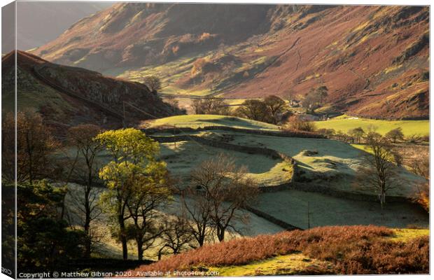 Majestic Autumn Fall landscape image of Sleet Fell and Howstead Brow in Lake District with beautiful early morning light in valleys and on hills Canvas Print by Matthew Gibson
