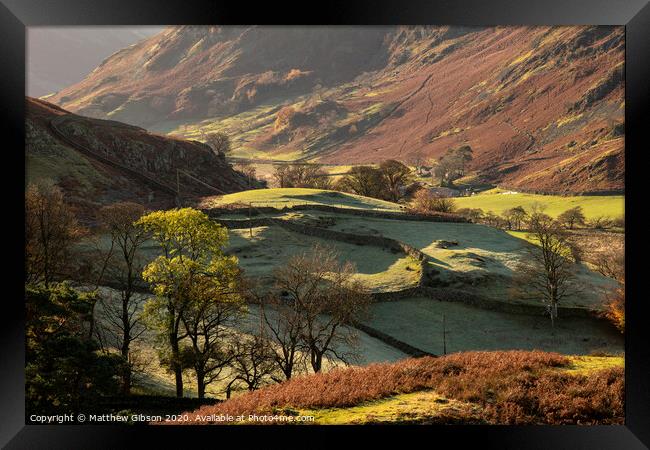 Majestic Autumn Fall landscape image of Sleet Fell and Howstead Brow in Lake District with beautiful early morning light in valleys and on hills Framed Print by Matthew Gibson