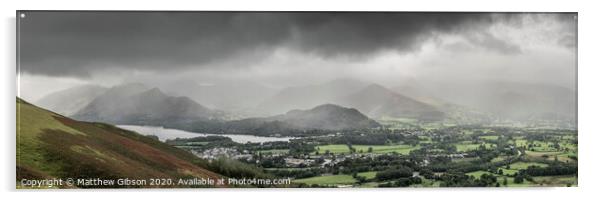 Stunning epic landscape image across Derwentwater valley with falling rain drifting across the mountains causing pokcets of light and dark across the countryside Acrylic by Matthew Gibson